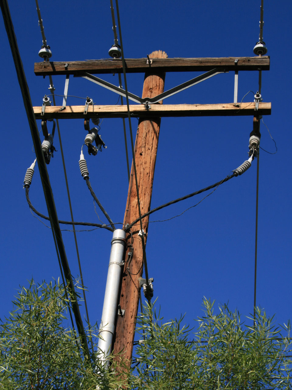 Power pole. Электрические столбы. Деревянный столб для электричества. Металлический столб для электричества на даче. Столбы для проводов с электричеством.